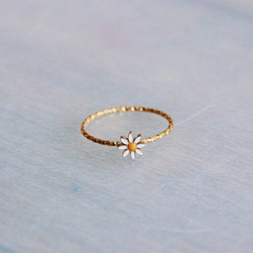 Bazou: RVS gedraaide ring met mini madeliefje bloem - goud